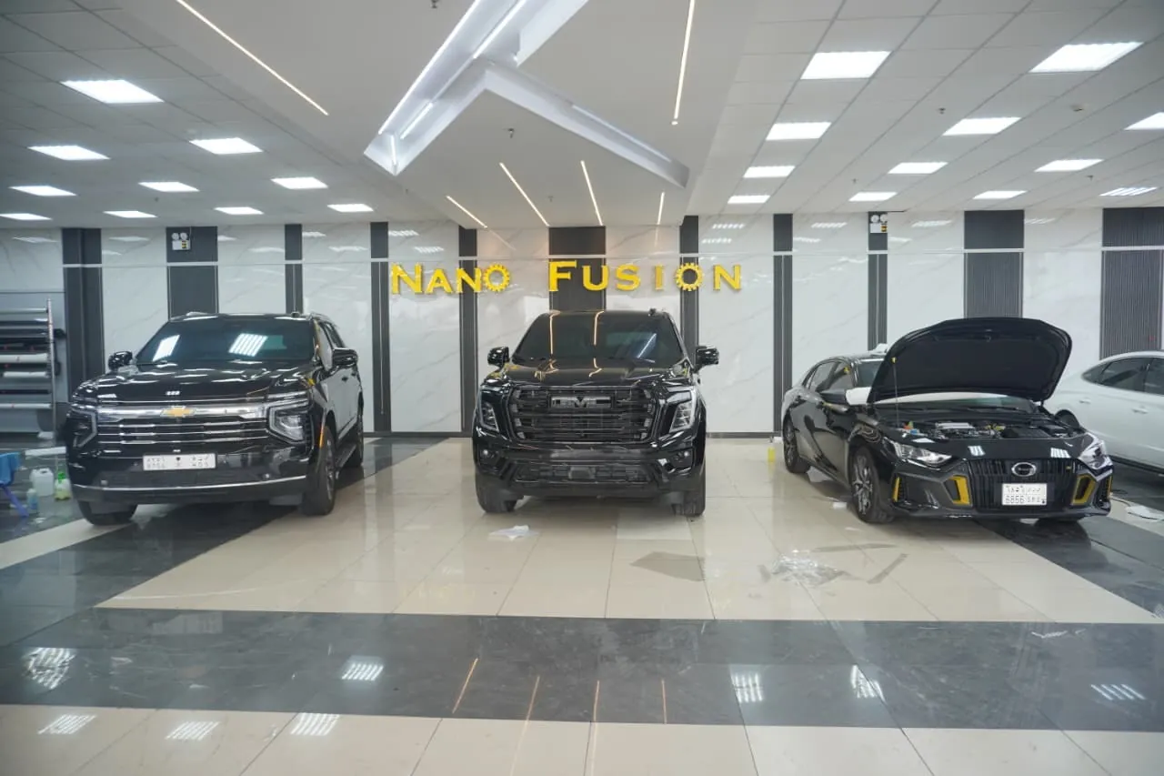 Technicians Detailing Work